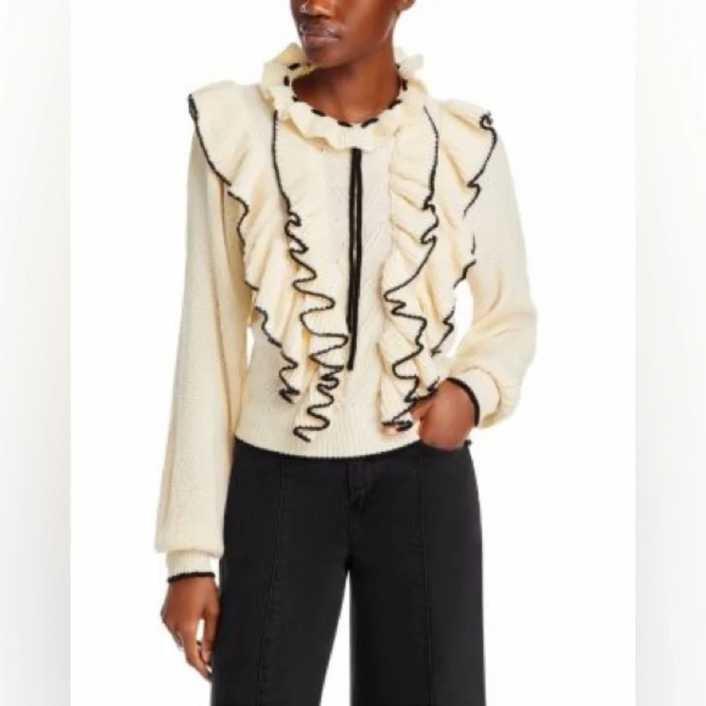 Stellah Ivory Sweater with Black Ruffle Accents
